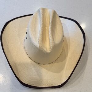 Classic Cream Cowboy Hat with brown Trim.